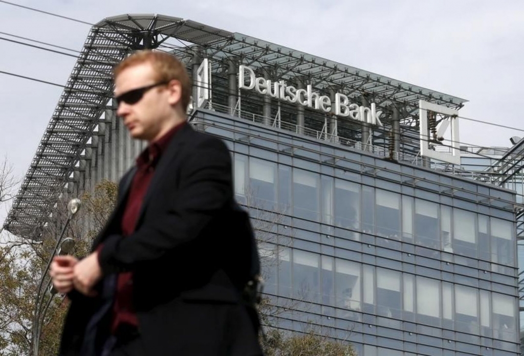 New Deutsche Bank boss makes a clean sweep flags six billion euro loss