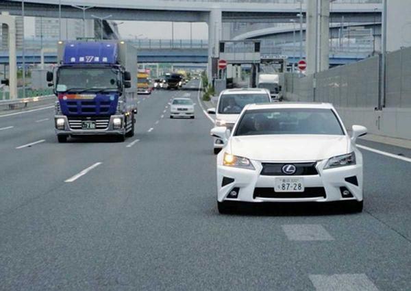 A self-driving car developed by Toyota Motor Corp. is operated on a public road during a test.     The Japan News  ANN