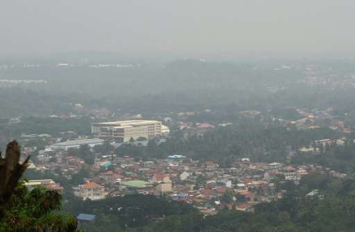 A thick haze believed to be from Indonesia's forest fires enguls the city of Davao on the southern island of Mindanao on Octob