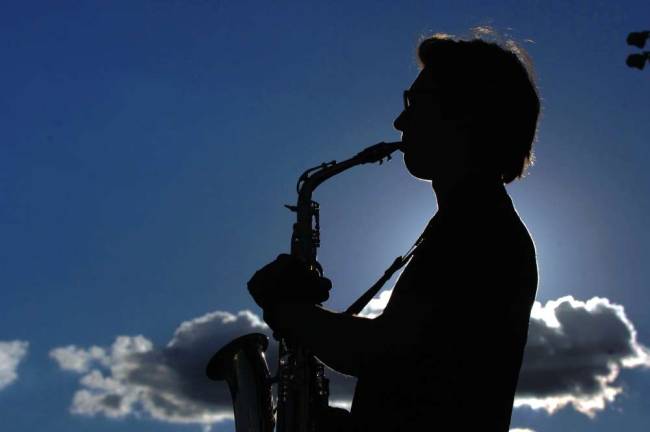 The Pequannock Township High School Marching Band will host a USBands competition with more than 20 bands expected to compete this Saturday. A PTHS band member is seen here rehearsing