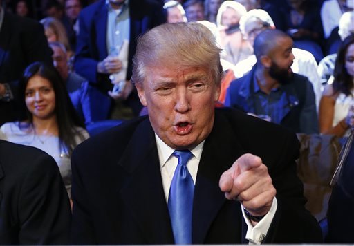 Republican presidential candidates businessman Donald Trump right and Ben Carson appear during the CNN Republican presidential debate at the Ronald Reagan Presidential Library and Museum in Simi Valley Calif