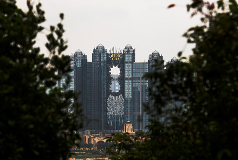 Studio City casino resort developed by Melco Crown Entertainment Ltd. stands in Macau China on Oct. 26. Melco Crown is touting a Batman ride Asia's highest ferris wheel and other Hollywood-centric features for Studio City which is scheduled to open