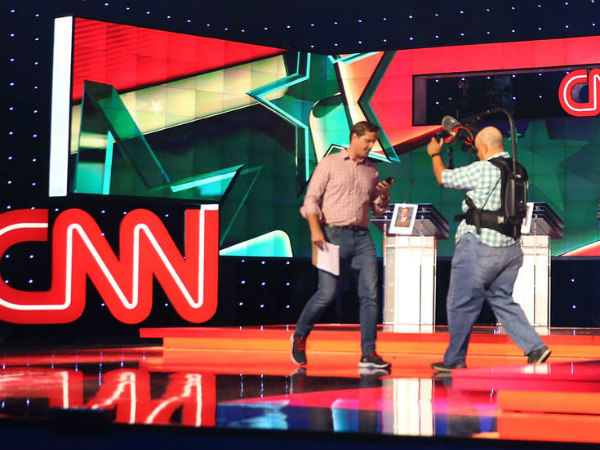 Workers prepare the stage for Tuesday´s Democratic presidential debate at the Wynn Las Vegas casino hotel