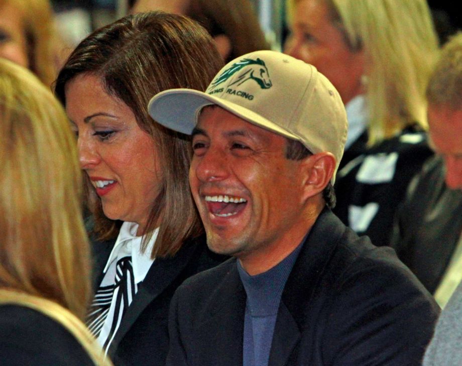 Triple Crown winning jockey Victor Espinoza shares a laugh before the Breeders Cup Classic horse race post position draw at Keeneland Race Course in Lexington Ky. Monday Oct. 26 2015. American Pharoah will break from post position No. 4 on Saturday