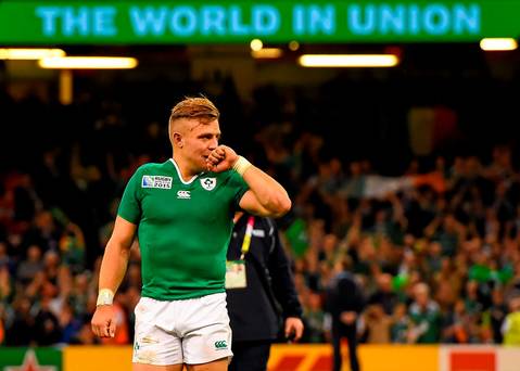 An emotional Ian Madigan salutes the fans after victory over France in Cardiff yesterday