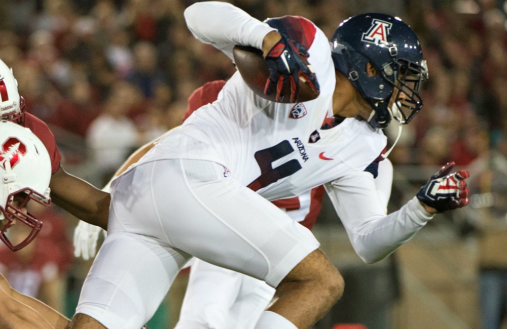 Stanford CA USA Arizona Wildcats wide receiver David Richards is tackled by Stanford Cardinal linebacker Blake Martinez during the first quarter at Stanford Stadium. Mandatory Credit Kyle Terada-USA TODAY Sports