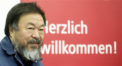 Chinese artist Ai Weiwei arrives for a news conference about his Einstein Professorship at the University Of Arts a in Berlin Monday Oct. 26 2015. Ai Weiwei will be starting teaching at the University in the winter semester of 2015-16. (AP