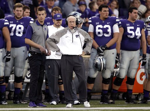 Kansas State head coach Bill Snyder center stands with his team during the first half of an NCAA college football game against TCU in Manhattan Kan. Saturday Oct. 10 2015