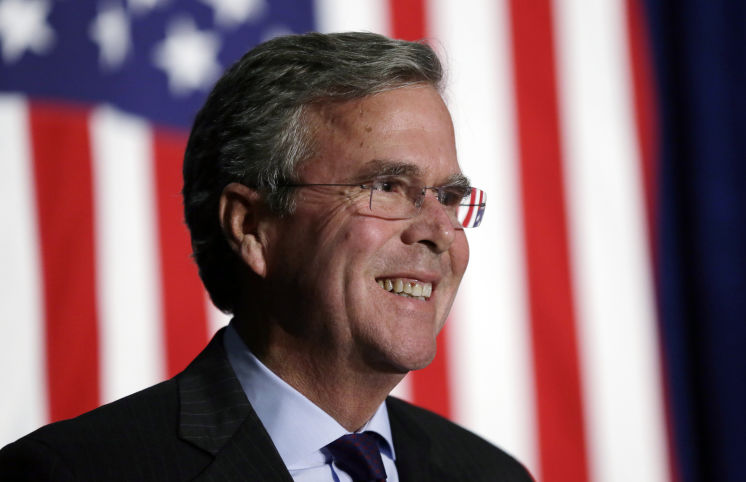 Republican presidential candidate former Florida Gov. Jeb Bush reacts to a supporter during the Scott County Republican Party's Ronald Reagan Dinner last week in Davenport Iowa