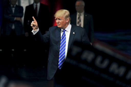 U.S. Republican Presidential candidate Donald Trump gestures as he greets the audience after speaking at a rally in Las Vegas Nev. Oct. 8 2015