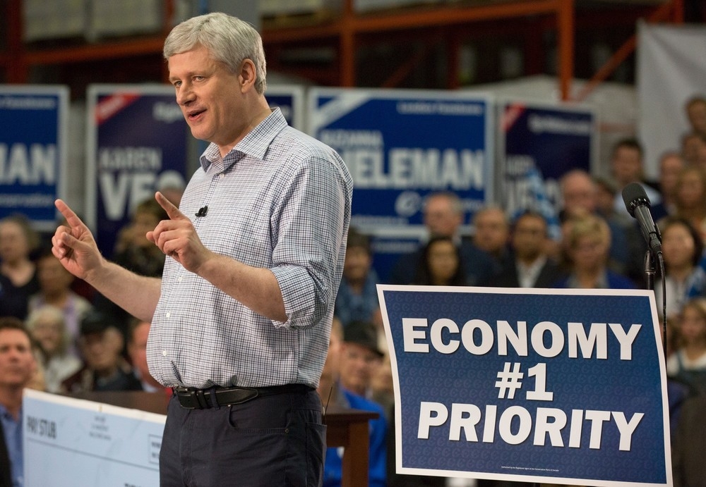 Canada PM poses for pictures with Rob Ford ahead of election