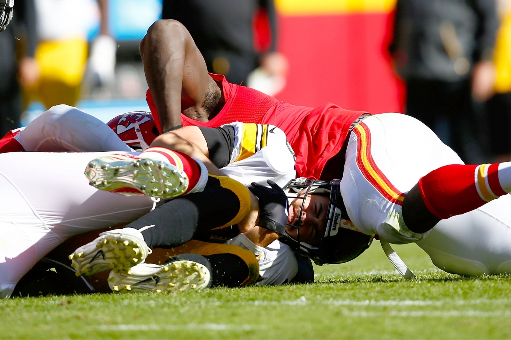 KANSAS CITY MO- OCTOBER 25 Landry Jones #3 of the Pittsburgh Steelers is sacked at Arrowhead Stadium during the fourth quarter of the game against the Kansas City Chiefs