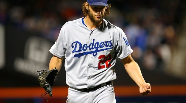 NEW YORK NY- OCTOBER 13 Clayton Kershaw #22 of the Los Angeles Dodgers reacts after Daniel Murphy #28 of the New York Mets flys out in the sixth inning during game four of the National League Division Series at Citi Field