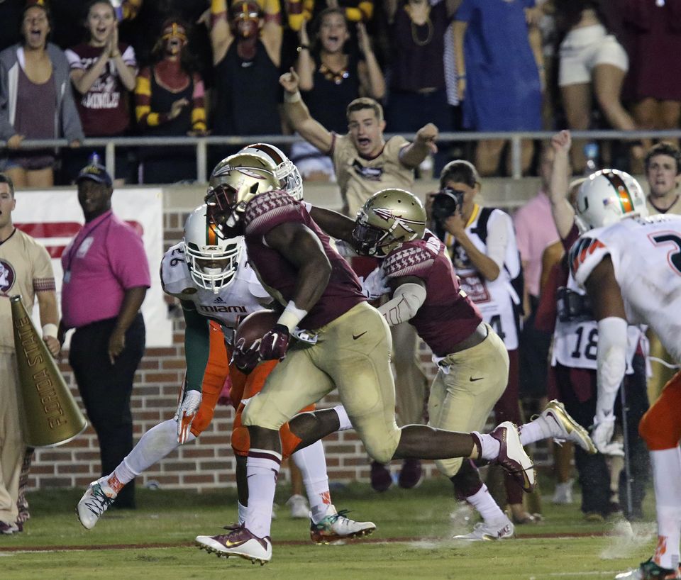 Cook runs for 222 yards No. 12 Florida State beats Miami