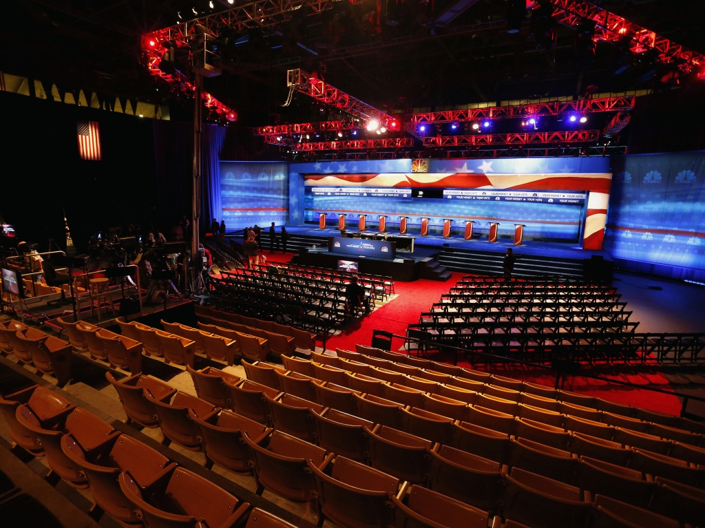 Crews prepare the venue for the CNBC Republican presidential debate inside the Coors Events Center at the University of Colorado.    Brennan Linsley    
  AP