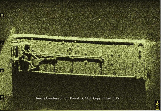 This undated image provided by Tom Kowalczk and created with a side scan sonar shows a sunken barge in Lake Erie. Underwater contractors are being sent to Lake Erie to search for the source of what appears to be a petroleum leak coming from the barge foun