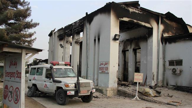 A vehicle is parked in front of a damaged building at the site of a US airstrike on the clinic of Doctors Without Borders in Kunduz northern Afghanistan