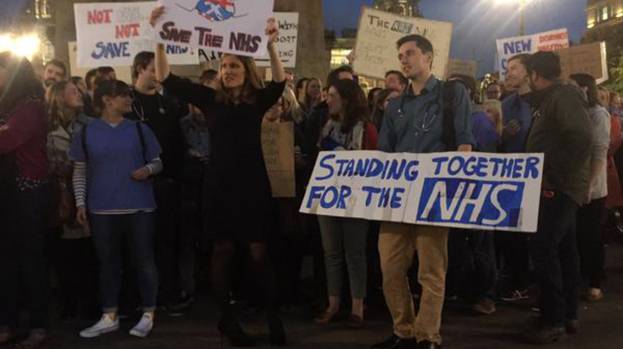 Doctors stage a protest in Glasgow's George Square over contract changes in England. Uploaded