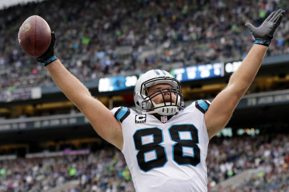 Carolina Panthers tight end Greg Olsen celebrates after catching a pass for a touchdown in the second half of an NFL football game against the Seattle Seahawks Sunday Oct. 18 2015 in Seattle. The Panthers defeated the Seahawks 27-23