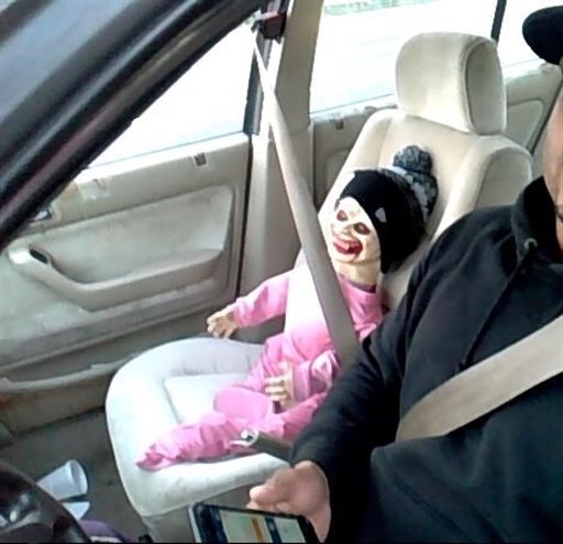 State Patrol shows a Halloween doll buckled up in the passenger seat of a car Tuesday Oct. 27 2015 in Tacoma Wash. During Tuesday's morning commute a trooper pulled over the man after he tried to use the doll to gain