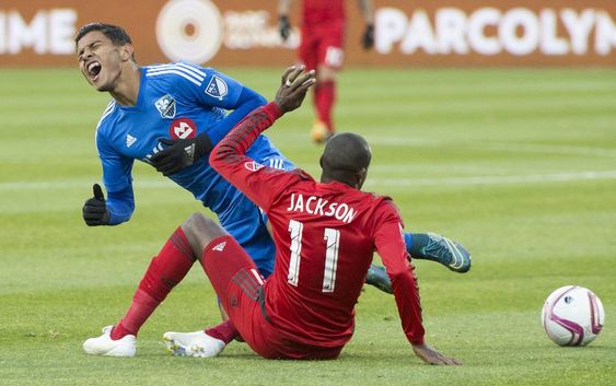 Venegas left challenges Toronto FC's Jackson during first half MLS soccer action in Montreal Sunday Oct. 25 2015