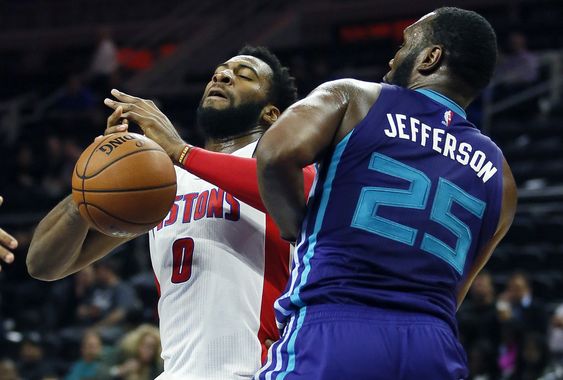 Drummond loses the ball against Charlotte Hornetsâ€™ Al Jefferson while going to the basket during the first half of a preseason NBA basketball game Wednesday Oct. 21 2015 in Auburn Hills Mich. (AP