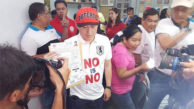 Christopher Go files the certificate of candidacy of Davao City Mayor Rodrigo Duterte on Thursday October 15. Duterte is seeking reelection as Davao City mayor