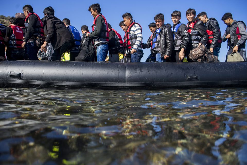 The Latest French pull 7 Syrians from cold water off Calais