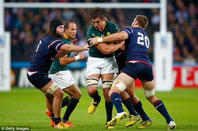 Eben Etzebeth collides with Cam Dolan of the USA during South Africa's convincing 64-0 victory