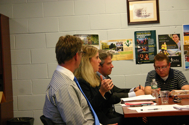 Superintendent Leonard Skuggevik Academic Administrator Jennifer Rylott Director of Physical Education and District Operations Todd Gulluscio and School Board member Alfred Brigham at Tuesday’s Board of Education