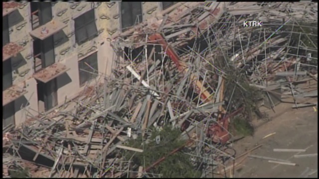 Emergency personnel have rescued six workers from beneath piles of rubble and twisted metal.                      KMGH