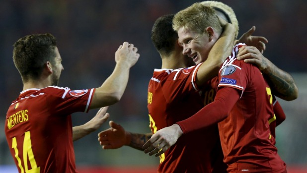 Belgium's Kevin De Bruyne right celebrates with Dries Mertens after scoring against Israel in Brussels