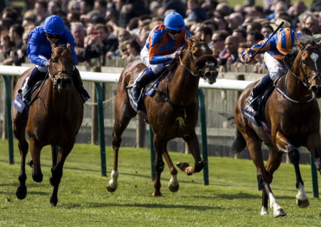 Gleneagles ridden by Ryan Moore leads the field home to win the QIPCO 2000 Guineas Stakes Race run during the QIPCO 2000 Guineas day of the QIPCO Guineas Festival at Newmarket Racecourse