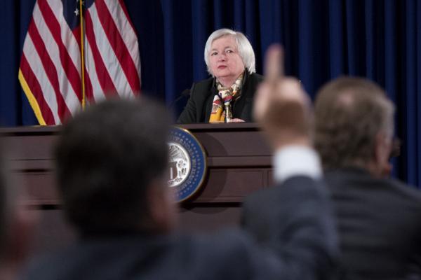 Fed awaiting evidence global chill not knocking US off track