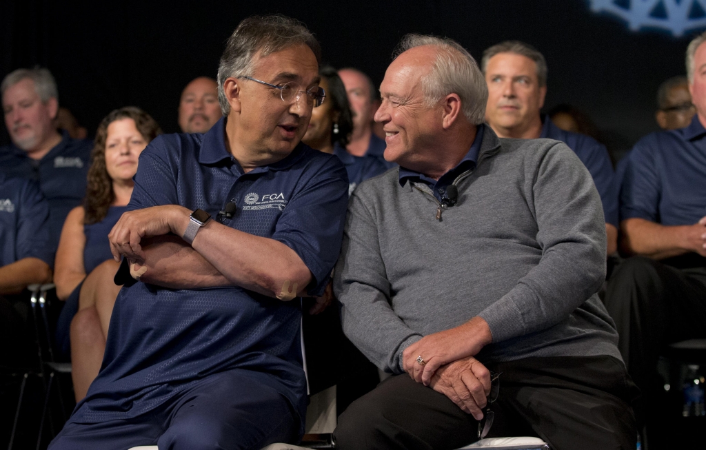 Fiat Chryler CEO Sergio Marchionne left and UAW President Dennis Williams