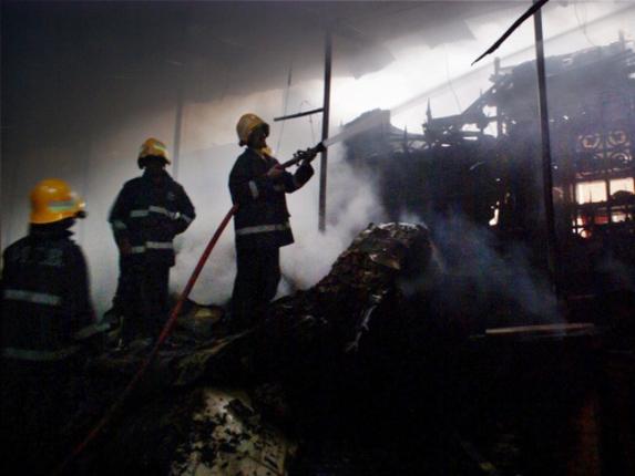 Firefighters trying to douse a massive fire that broke out in Crawford Market in Mumbai on Sunday. Fifty shops were gutted in the incident