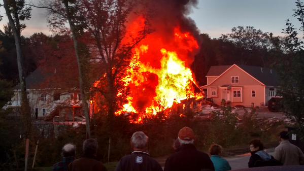 Flames rip through a building under construction in Franklin