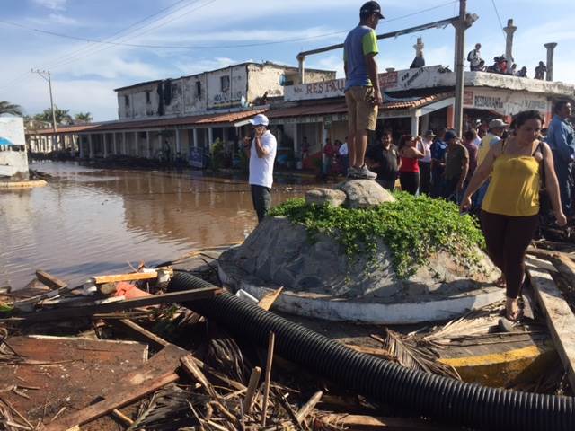 Flooding and debris in the aftermath of Hurricane Patricia is seen in Playa Paraiso near Manzanillo Saturday. Gabe Gutierrez  NBC News