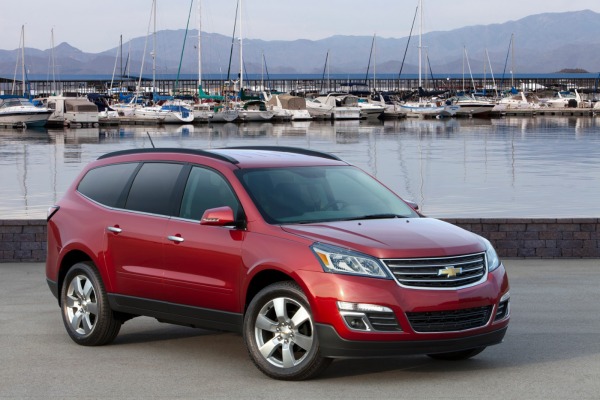 Motors shows the 2016 Chevrolet Traverse LTZ. General Motors on Thursday Oct. 8 2015 said it is recalling nearly 32,000 Buick Enclave Chevrolet Traverse and GMC Acadia SUVs from the 2016 model year because an elec