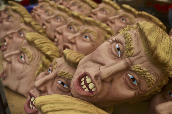 Masks representing US Republican presidential candidate Donald Trump are