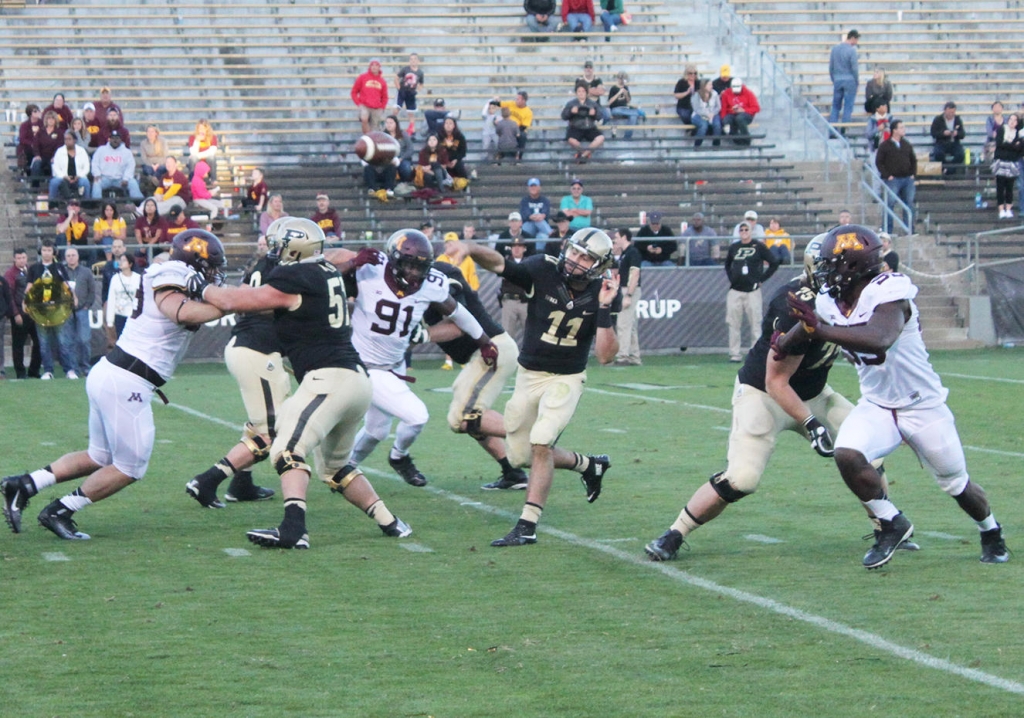 Purdue quarterback David Blough throws a pass late in Saturday's loss to Minnesota. Blough was 21-49 passing with one touchdown and three interceptions on the day