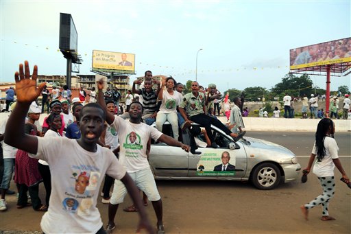 8 2015 thousands of supporters of UFDG presidential candidate Cellou Dalein Diallo cheer in a street during a political rally in the city of Conakry Guinea. Political clashes between the opposition and ruling party