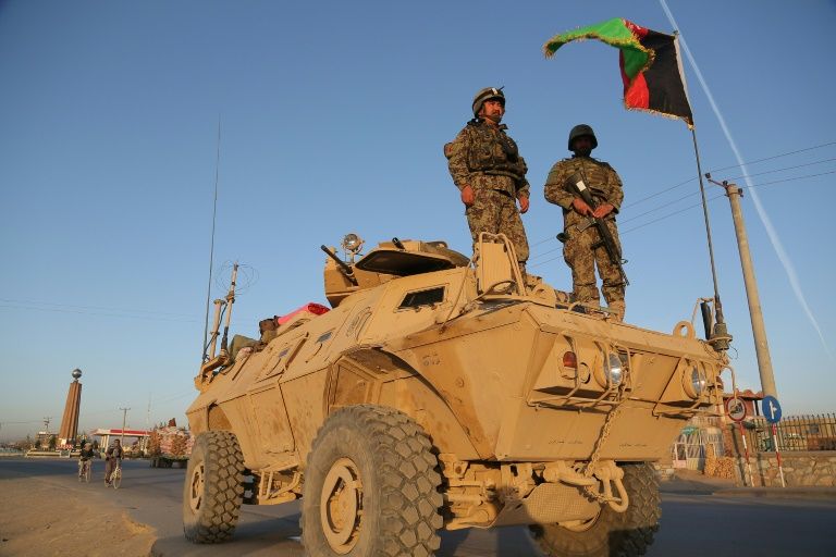 Gunfights after resurgent Taliban threaten new Afghan city