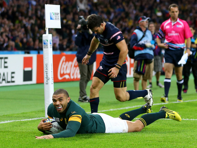 South Africa's Bryan Habana scores his hat-trick try