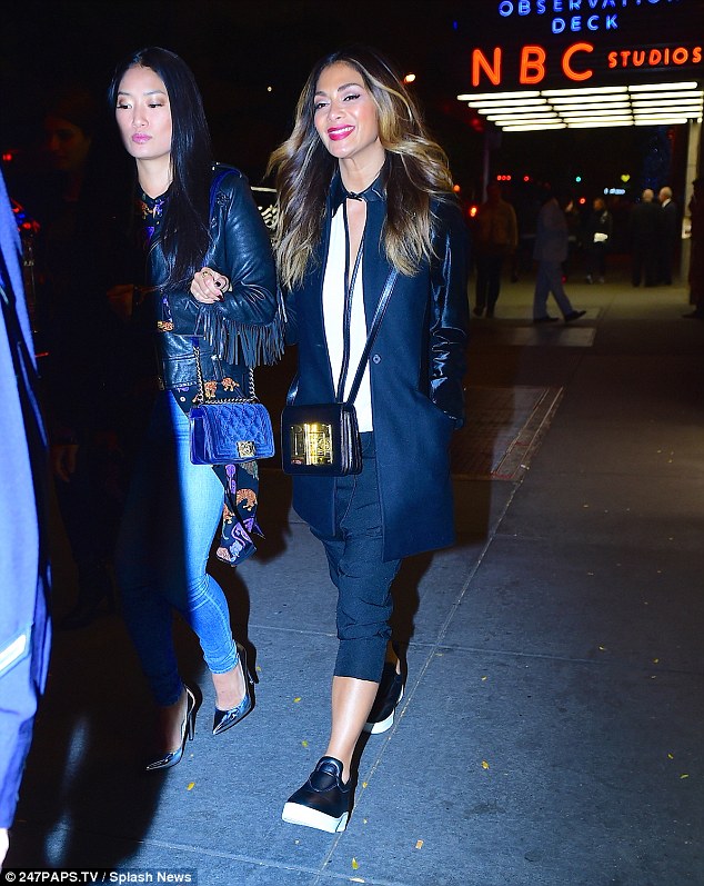 Girls night Nicole Scherzinger enjoyed an evening out in New York on Friday watching the Live Orchestra rendition of Back to the Future at Radio City Music Hall