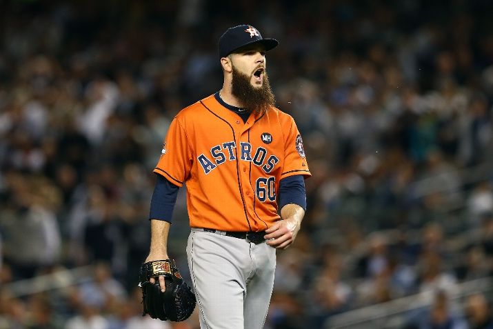 NEW YORK NY- OCTOBER 06 Dallas Keuchel #60 of the Houston Astros celebrates after striking out the New York Yankees in the first inning during the American League Wild Card Game at Yankee Stadium