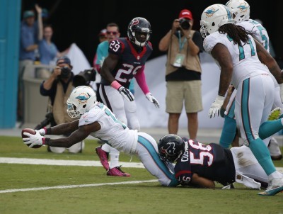 4 big plays early help Dolphins drub Texans 44-26