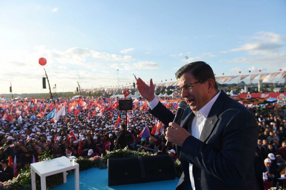 Turkish Prime Minister Ahmet Davutoglu and leader of the Justice and Development Party, delivers his speech at a rally in Istanbul Sunday Oct. 25 2015 ahead of the Nov. 1 general elections