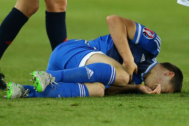 Northern Ireland's Paddy Mc Nair down injured against Finland in the Euro 2016 qualifier