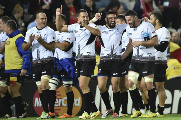 AFP  File  Bertrand LangloisRomania's players celebrate winning the Pool D match of the 2015 Rugby World Cup between Canada and Romania at Leicester City Stadium in Leicester central England